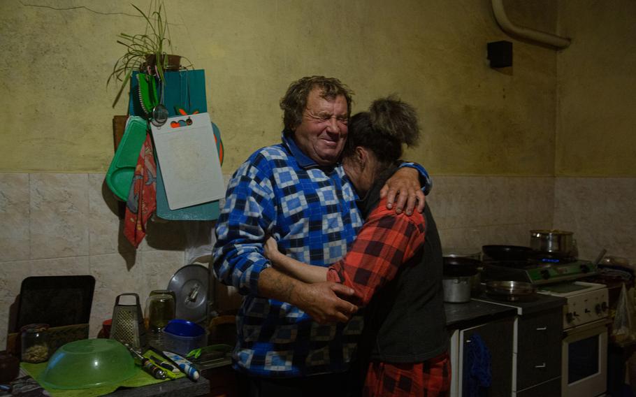 Fydor Pahomov and his wife, Natalia, at home in the village of Berdyanske, recall memories of surviving the shelling of nearby Shyrokyne during the war with Russia-backed separatists. 