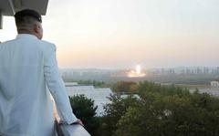 North Korean leader Kim Jong Un observes a missile launch in this undated photo from the state-run Korean Central News Agency. 