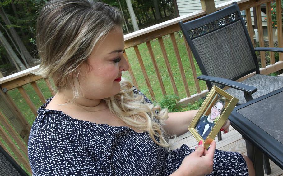 Photos of U.S. Army Specialist Christopher Horton are cherished memories for Lorain County native Jane Horton, who lost her husband in Afghanistan in 2011. Photographed October 14, 2021.