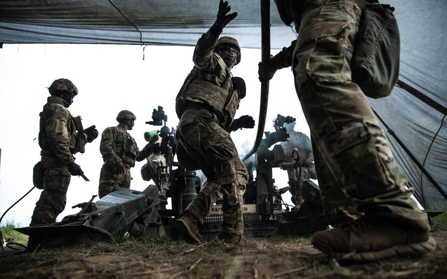 U.S. soldiers assigned to the 1st Platoon, Archer Battery, Field Artillery Squadron, 2nd Cavalry Regiment, clear the breach of their M777 towed 155 mm howitzer during a fire support coordination exercise as part of Griffin Shock 23 held at Bemowo Piskie, Poland, May 18, 2023.