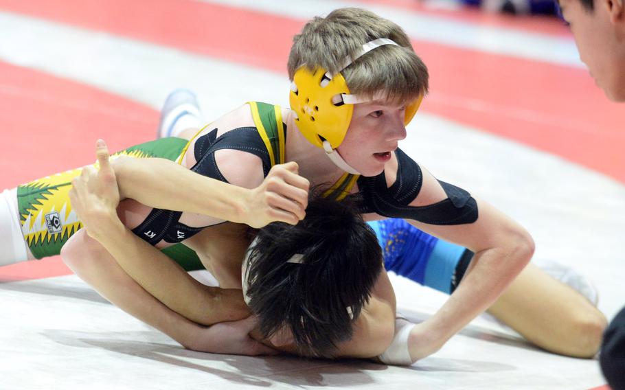 Edgren's Joey Phillips held an 8-2 lead over St. Mary's Hugo Miyamoto at 107 pounds, but Miyamoto came back for a pin, one of three Titans defending champions to repeat.
