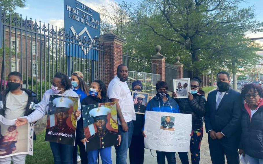 Oronde McClain, fourth from left, was shot in the head when he was 10. Now 31, he works as a psych tech at the Philadelphia VA Medical Center.