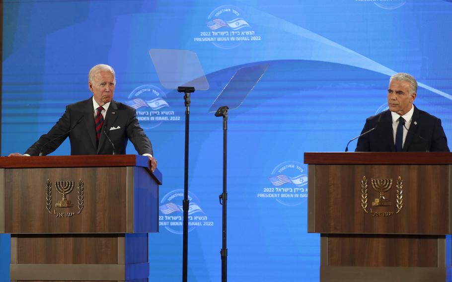 U.S. President Joe Biden, left, gives a press conference with Israel’s Prime Minister Yair Lapid, at the Waldorf Astoria Hotel in Jerusalem, Thursday, July 14, 2022.
