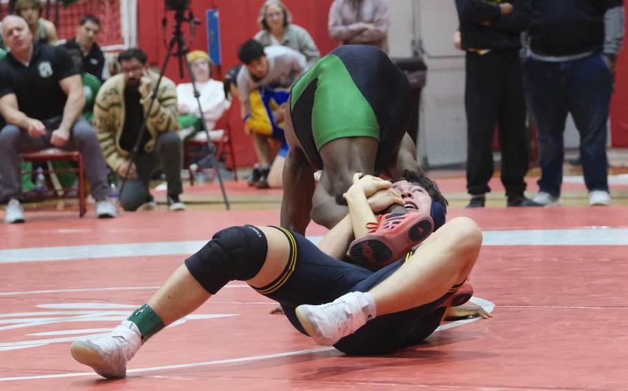 Bryce Clement of American School in Japan  defeated Kubasaki’s Godfrey Wray to win the Beast of the East 141-pound weight class.