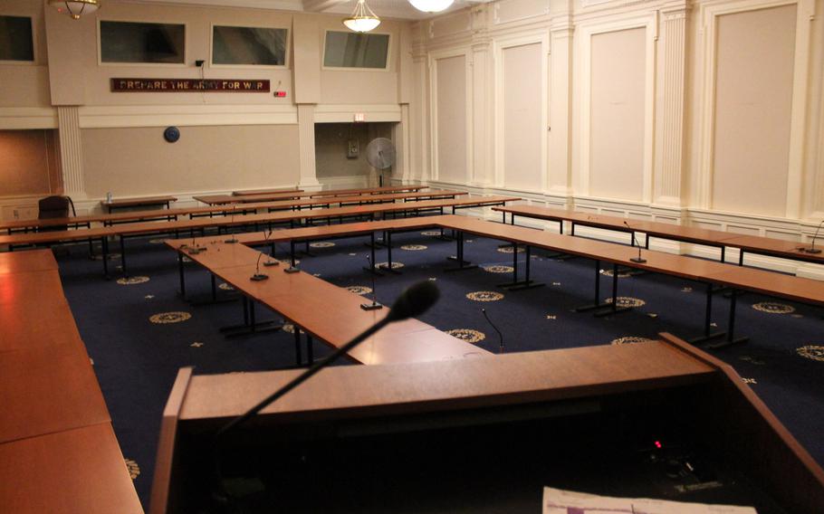 Conference tables and microphones are set up in a former Army briefing room in one of 14 buildings Fort Monroe leaders hope to redevelop.