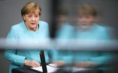 German Chancellor Angela Merkel delivers her specs ahed of a EU summit at the German parliament Bundestag in Berlin, Germany, Thursday, June 24, 2021. (AP Photo/Markus Schreiber)