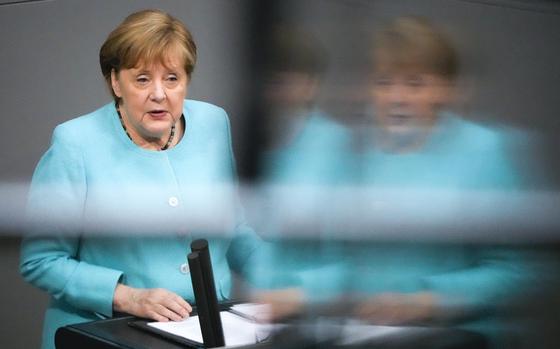 German Chancellor Angela Merkel delivers her specs ahed of a EU summit at the German parliament Bundestag in Berlin, Germany, Thursday, June 24, 2021. (AP Photo/Markus Schreiber)