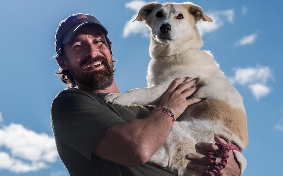 Marine Corps veteran Craig Grossi with Fred, the stray dog he brought home from Afghanistan. 