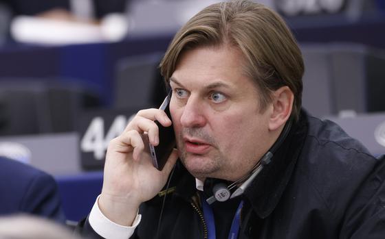 Germany's Maximilian Krah, of the far-right Alternative, calls during a session at the European Parliament, Tuesday, April 23, 2024 in Strasbourg, eastern France. A man who works for the prominent German far-right lawmaker in the European Parliament has been arrested on suspicion of spying for China, authorities said Tuesday. (AP Photo/Jean-Francois Badias)
