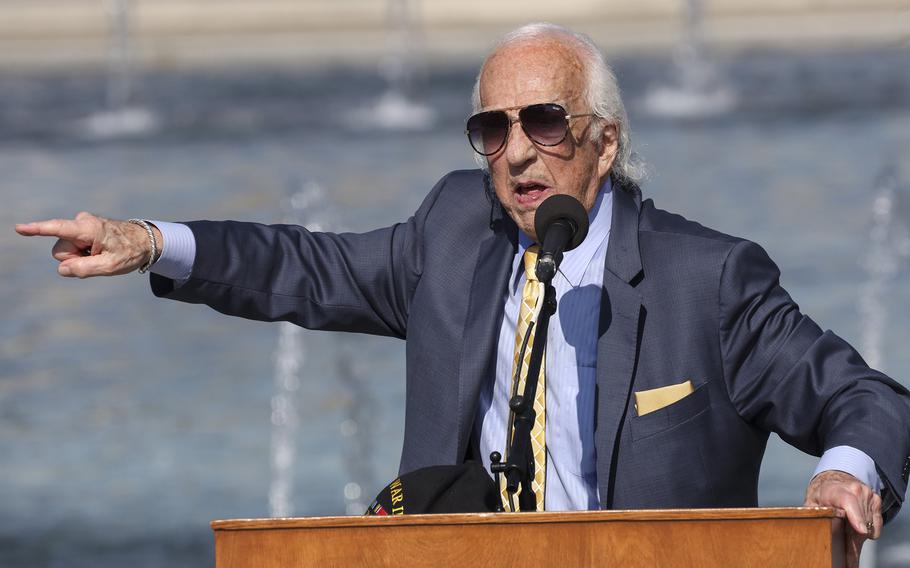 World War II Merchant Marine veteran Dave Yoho speaks on Memorial Day at the National World War II Memorial in Washington,. D.C., Monday, May 30, 2022.