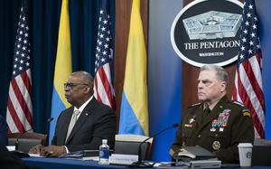 Secretary of Defense Lloyd Austin gives opening remarks accompanied by Joint Chiefs Chairman Gen. Mark Milley at a virtual meeting of the Ukraine Defense Contact Group at the Pentagon, Monday, May 23, 2022, in Washington.