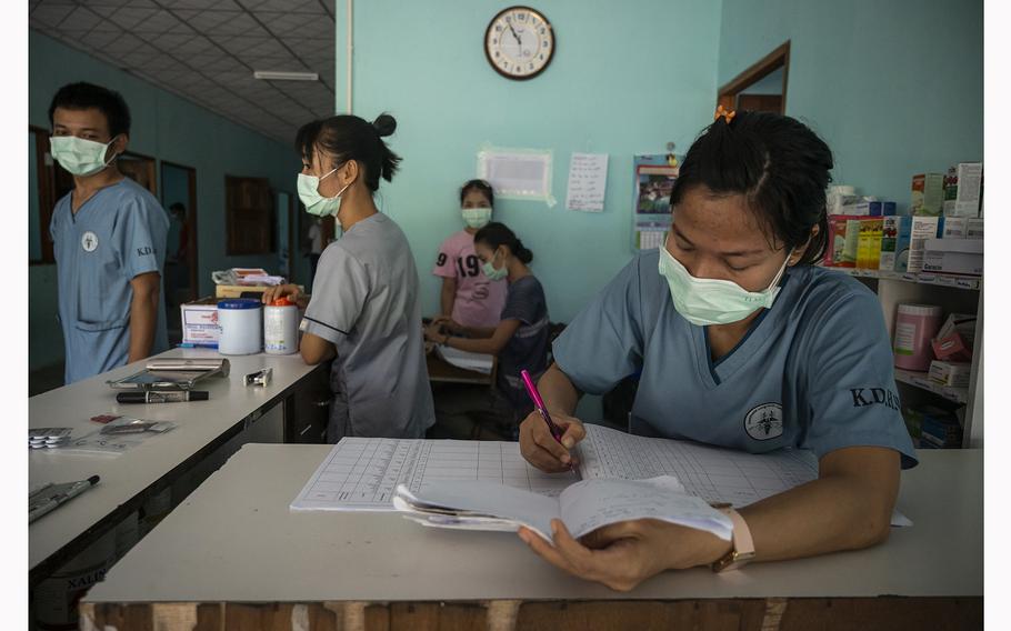 Medical personnel work at a hospital in Karen-held territory. 