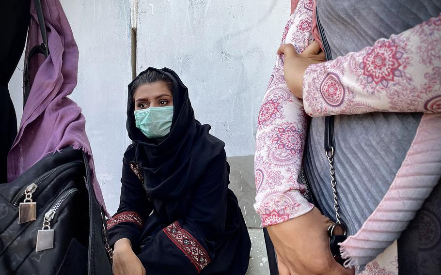 Mariam Hashimi, 25, sits down in shock after learning a group of friends making their way to central Kabul was arrested by the Taliban. Hashimi, who has attended many protests under Taliban rule, says the militant crackdown on Sept. 8, 2021, was the harshest she's seen since the group overran the Afghan capital. 