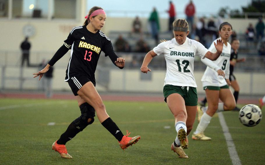 Sydney Pontious kicks the ball foward.