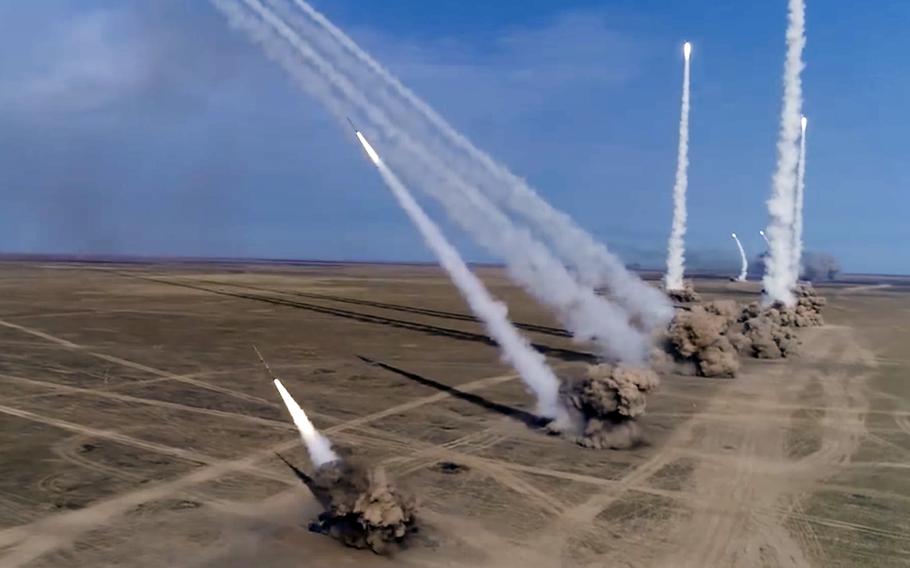 A video screen grab posted on Sept. 26, 2020, shows Russian rockets launching from missile systems during an exercise at the Kapustin Yar training ground in Russia. 