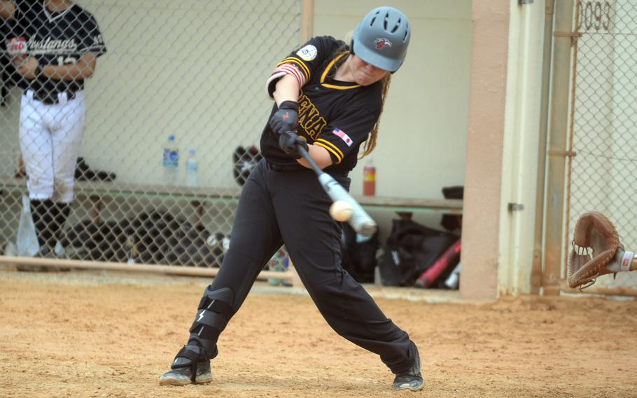 Gunnison West hits the ball.