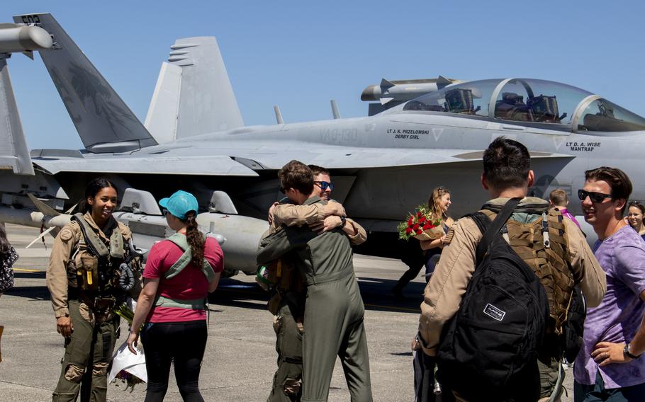 Pilots assigned to the Electronic Attack Squadron 130 are greeted by friends, family and service members upon their return home to Naval Air Station Whidbey Island, Wash., July 13, 2024.