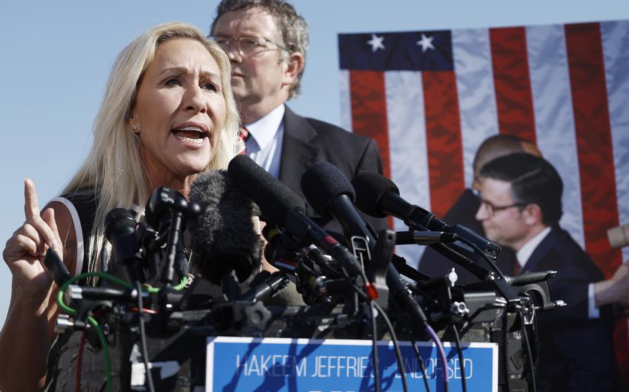 Rep. Marjorie Taylor Greene (R-Ga.) speaks at a news conference alongside Rep. Thomas Massie (R-Ky.) at the Capitol on May 1, 2024, in Washington. 