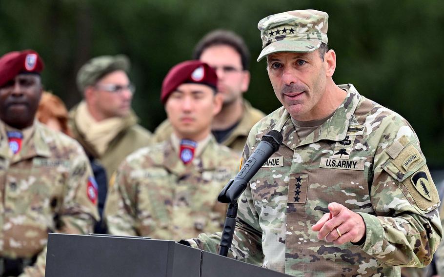 General Christopher Donahue speaks in front of soldiers.