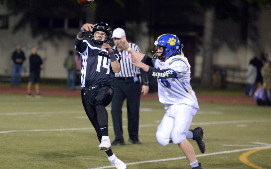 Zama’s Kai Kuroda gets off a pass just before getting hit by Yokota’s Matthew Hullman.