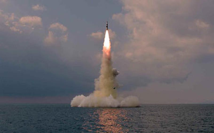 This photo released by the Korean Central News Agency show a submarine-launched ballistic missile test by North Korea, Tuesday, Oct. 19, 2021.