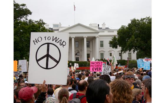 Washington, D.C., Sept. 24, 2005: Two-and-a-half years after the 2003 start of Operation Iraqi Freedom thousands of anti-war protesters march past the North Portico of the White House. The march marked the start of three days of protest, grassroots lobbying, and civil disobedience throughout the capital. Thousands of protesters attended rallies in other U.S. cities, as well as London and Paris and other cities worldwide. 

Read Stars and Stripes' article on the protest and counter-protest here.
https://www.stripes.com/news/multiple-messages-delivered-in-huge-d-c-protest-1.migrated

META TAGS: Washington; D.C.; protest; anti-war; demonstration; Iraq; Afghanistan