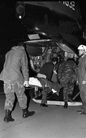 A burn victim on a stretcher.