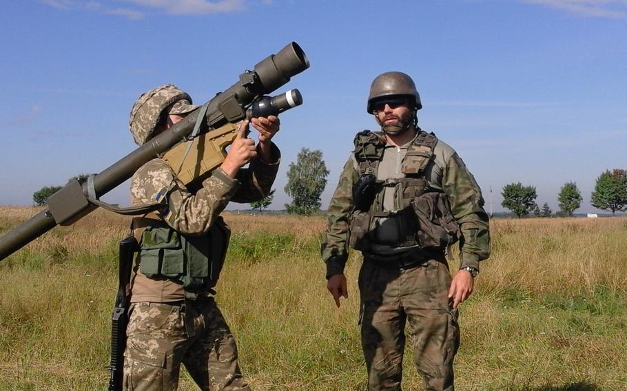 A Polish instructor assigned to the 21st Podhale Riflemen Brigade instructs a Ukrainian Soldier how to fire the 9K333 “Verba” portable air defense missile system.