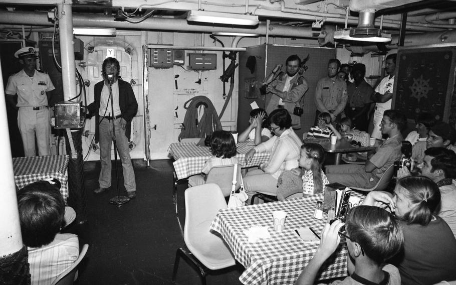 Mark Hamill, better known to many as young Jedi Luke Skywalker of Star Wars fame, takes questions at a gathering aboard the U.S. Navy destroyer Hammond, docked at Yokosuka Naval Base. Hamill — in Japan on a Stars Wars publicity junket — took a sentimental detour to his old military brat stomping grounds from the time his father — a Navy Exchange officer — was stationed at Yokosuka.