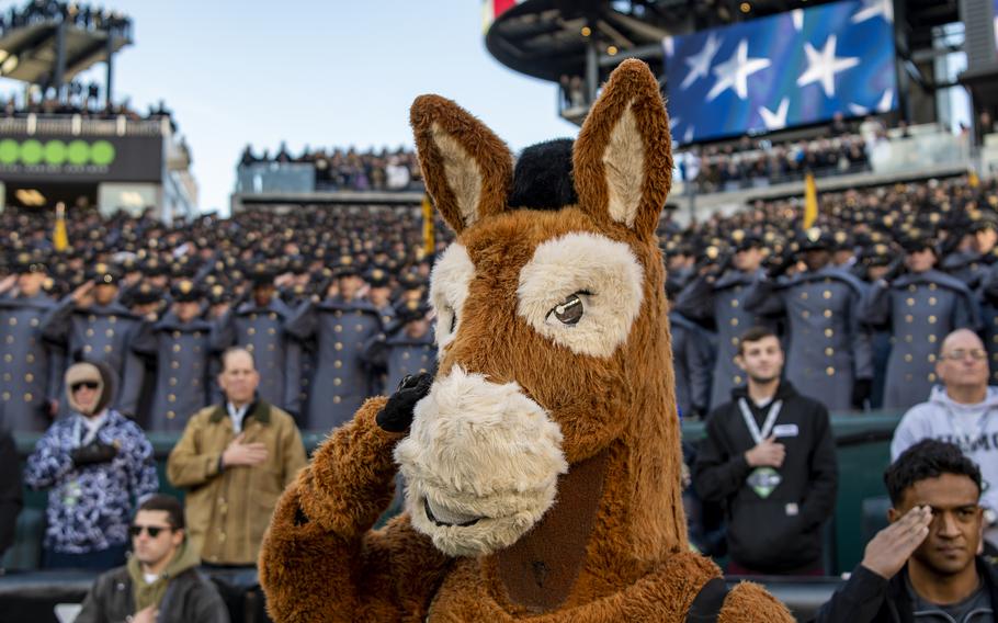 The Army Academy’s mule mascot salutes during the playing of the National Anthem at Lincoln Financial Field in Philadelphia, where the annual Army-Navy game was played on Saturday, Dec. 10, 2022. Army won 20-17 in double overtime.