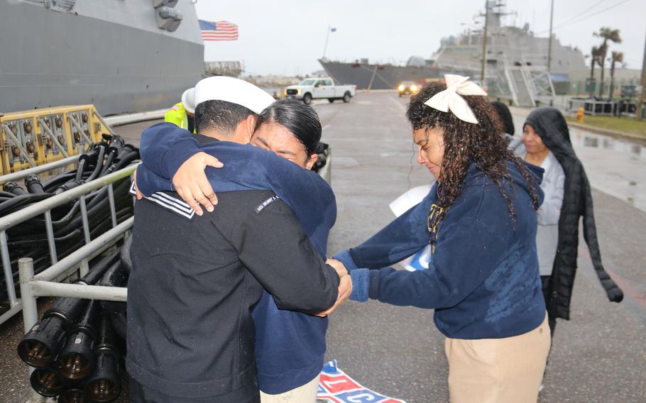 Family and friends greet the crew of the USS Delbert D. Black at Naval Station Mayport, Fla., Sunday, Feb. 18, 2024.