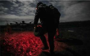 Ukrainian forces operate during a Vampire drones night mission on the front line in Ukraine on Oct. 28, 2023.