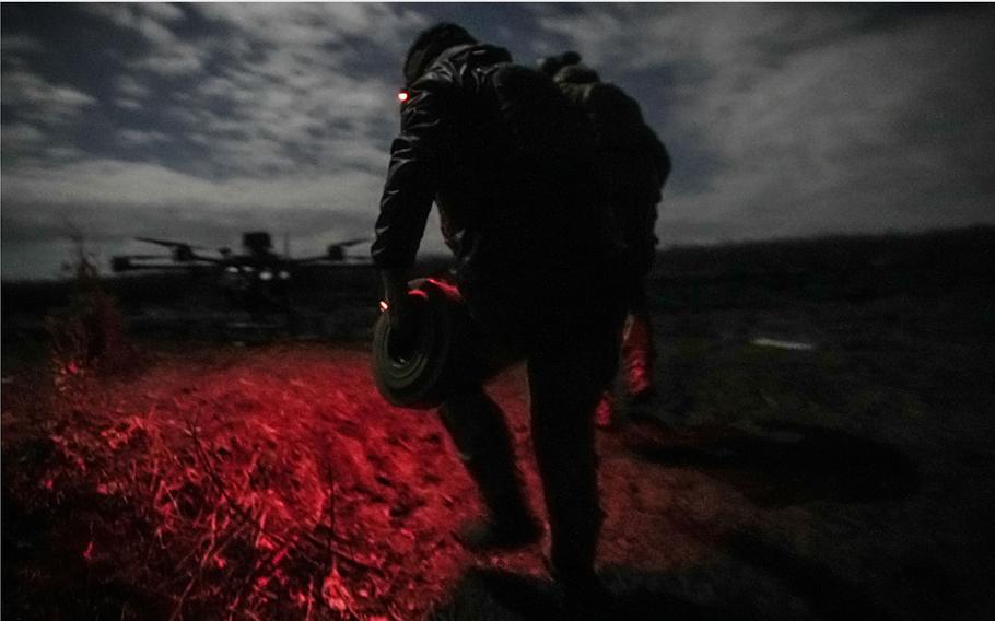 Ukrainian forces operate during a Vampire drones night mission on the front line in Ukraine, on Oct. 28, 2023.