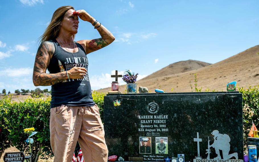 Shana Chappell stands at her son’s grave at Pierce Brothers Crestlawn Memorial Park and Mortuary in Riverside, Calif., on Thursday, Aug. 18, 2022. Chappell lost her 20-year-old son Marine Lance Cpl. Kareem Nikoui on Aug. 26, 2021, in the bombing at Afghanistan’s Kabul airport. On Tuesday, Aug. 9, 2022, her 28-year-old son, Dakota Halverson, took his own life at Pikes Peak Park in Norco, near a memorial for his brother, the Riverside County coroner’s office said. 