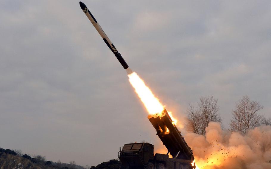 A North Korean missile is launched in this image released by the state-run Korean Central News Agency, Friday, Jan. 28, 2022.