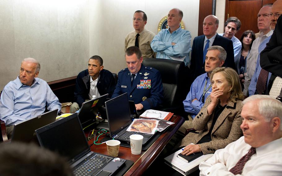 In this handout image provided by The White House, President Barack Obama, Vice President Joe Biden, Secretary of State Hillary Clinton and members of the national security team are said to receive an update on the mission against Osama bin Laden in the Situation Room of the White House on May 1, 2011, in Washington, D.C. (A classified document visible in this photo was obscured by The White House.