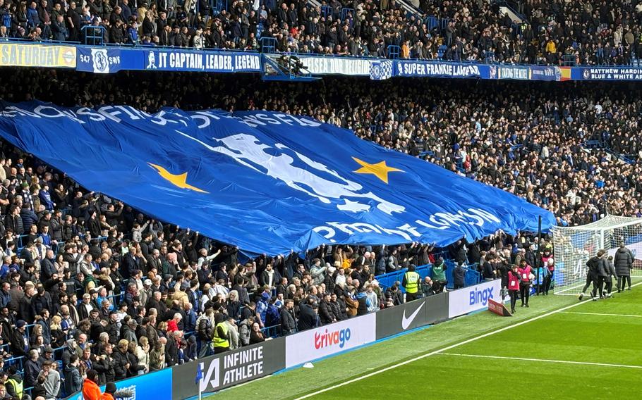 Fans of Chelsea Football Club welcome Leicester City to Stamford Bridge in London with a giant banner prior to the FA Cup quarterfinal on March 17, 2024. 