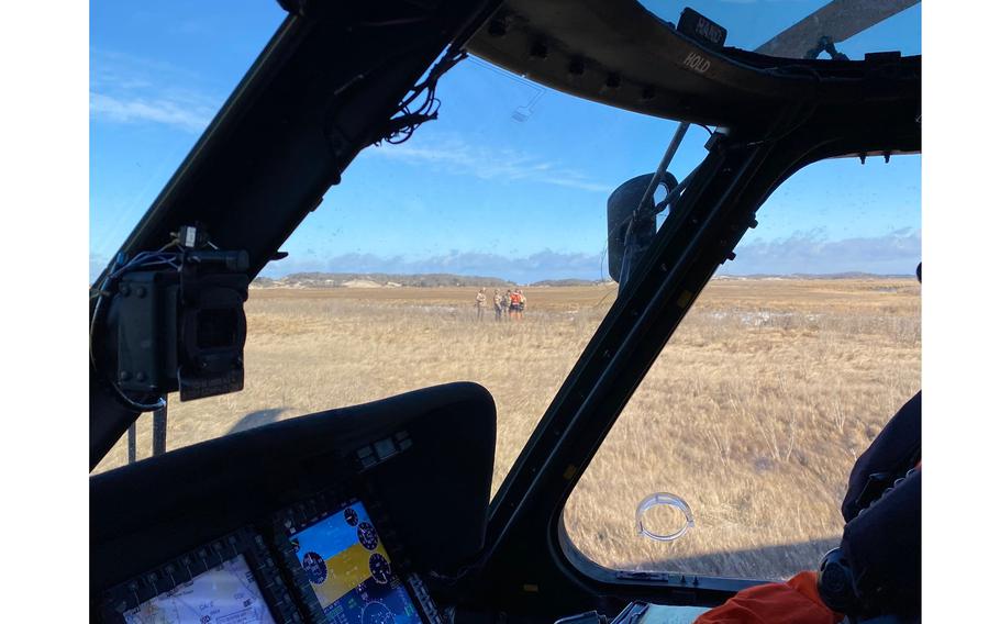 Coast Guard Air Station Cape Cod’s Jayhawk crew rescued six stranded duck hunters from a marsh near Barnstable Harbor, Mass., on Jan. 15, 2022. 