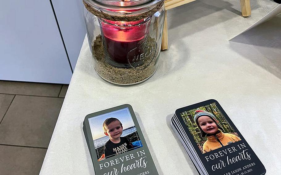Cards with photos of Caleb Anders read “Forever in Our Hearts.”