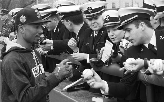 Annapolis, Md., April 1, 2017.: Boston Red Sox outfielder Mookie Betts signs autographs for U.S. Naval Academy midshipmen before the Naval Academy Classic.

META TAGS: U.S. Naval Academy; U.S. Navy; MLB; baseball; 