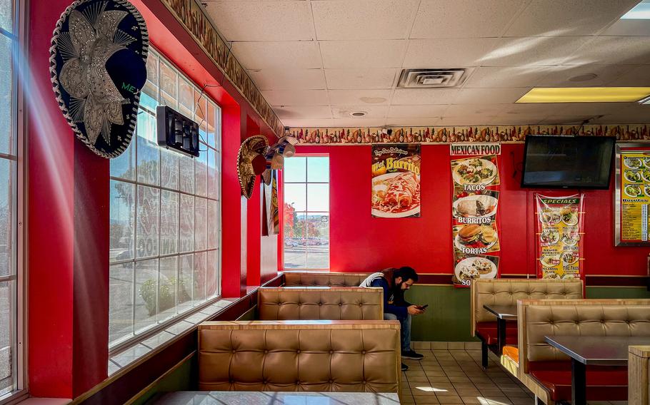 A customer sits in a booth at Alvaro’s Mexican Food, the St. George restaurant owned by Rubio’s in-laws. 