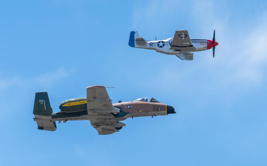 U.S. Air Force Maj. Lindsay “MAD” Johnson, A-10C Thunderbolt II Demonstration Team commander and pilot, left, and a P-51 Mustang perform a heritage flight during Tampa Bay AirFest at MacDill Air Force Base, Fla., Saturday, March 30, 2024.