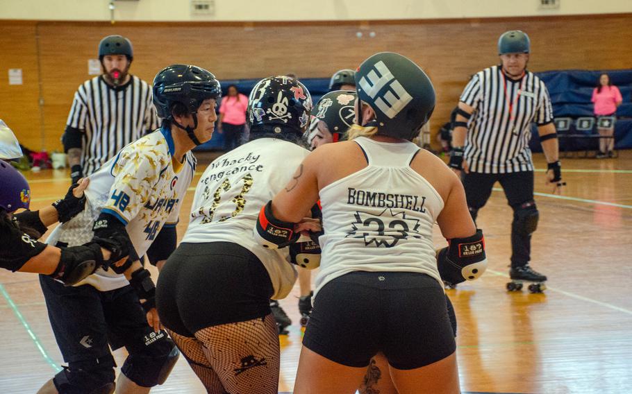 The Vampires and Werewolves roller derby teams compete inside Purdy Gym at Yokosuka Naval Base, Japan, June 17, 2023.