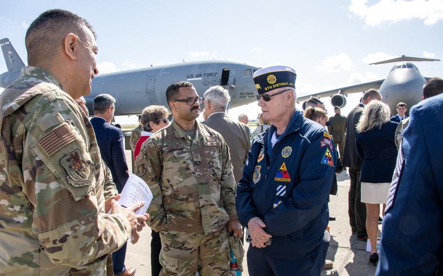 U.S. airmen, military veterans, community and family members attend the passenger terminal renaming and flight line monument marker dedication ceremony at Travis Air Force Base, Calif., March 31, 2023. The event was part of the 50th anniversary of Operation Homecoming commemoration to honor and celebrate American prisoners of war returning from Vietnam in 1973.