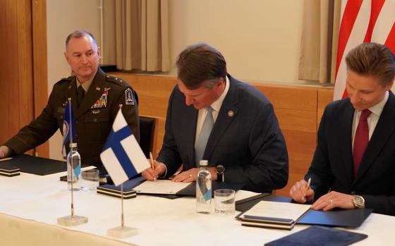The Virginia National Guard formalized its partnership with the Finnish military during a signing ceremony May 2, 2024, in Helsinki, Finland. The letter of intent, signed by Virginia Governor Glenn Youngkin, center, Finnish defense minister Antti Häkkänen, and Maj. Gen. James W. Ring, the adjutant general of Virginia, recognizes the pairing as part of the National Guard Bureau's State Partnership Program.