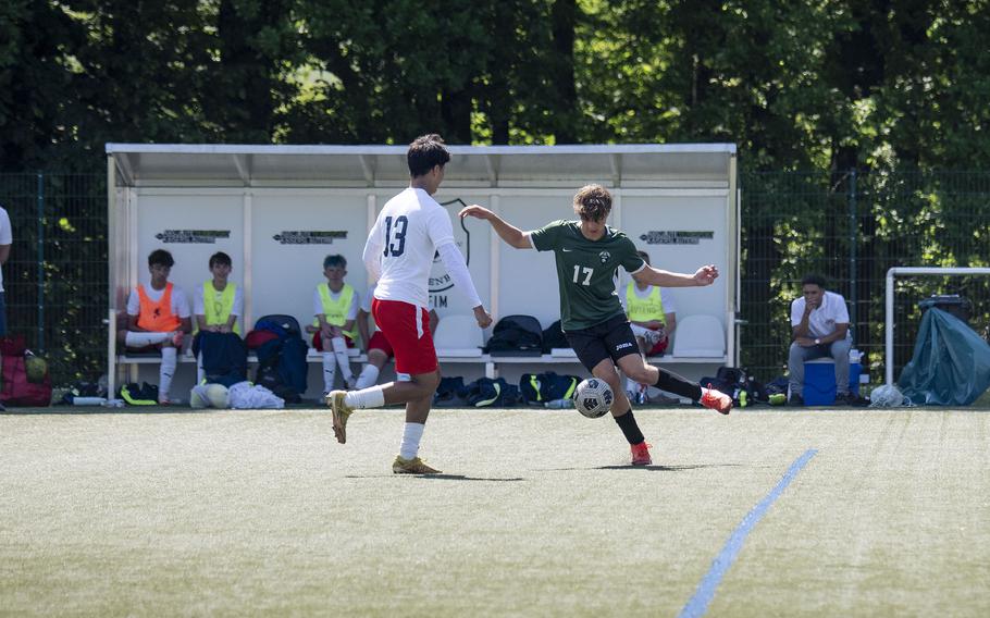 Magnus Aul, a junior with the Naples Wildcats, advances on Aviano defender Joseph Guerrero during the Division II DODEA European Championships at Reichenbach-Steegen, Germany on May 20, 2025.