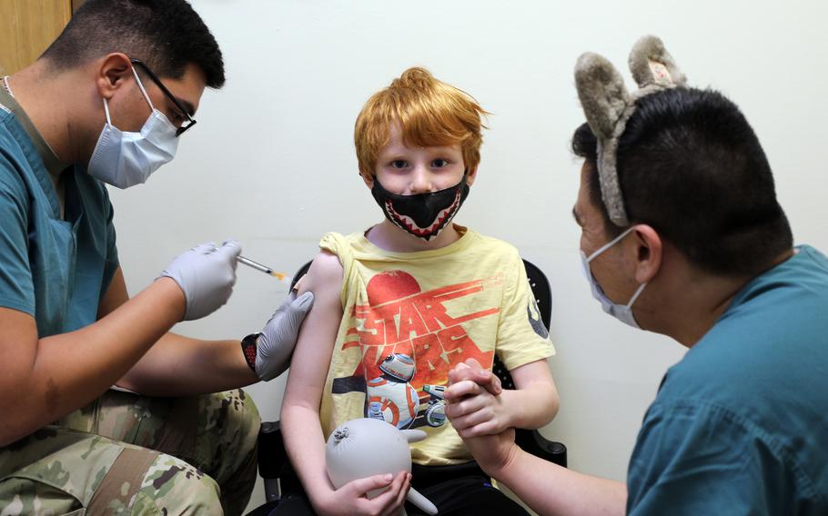 Will Henjum, 7, is the first to receive the Pfizer-BioNTech pediatric COVID-19 vaccine at Camp Humphreys, South Korea, Nov. 17, 2021.