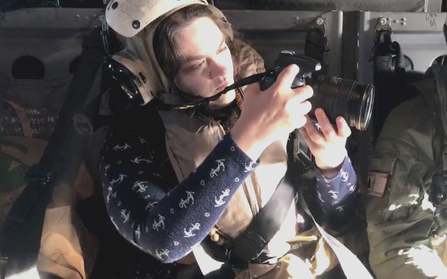 Stars and Stripes reporter Kelly Agee, shown here over the Coral Sea on July 31, 2023.
