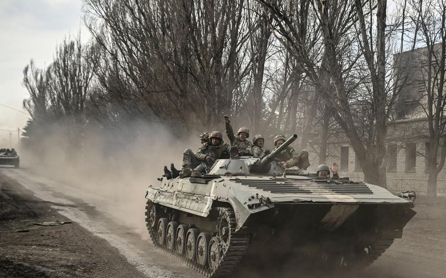 Ukrainian servicemen head toward Bakhmut in a BMP infantry fighting vehicle in eastern Ukraine on March 22, 2023.