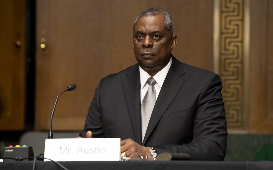 Defense Secretary Lloyd Austin listens to a question during his Senate Armed Services Committee confirmation hearing in January 2021. 
